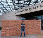Artist Bosco Sodi with his piece Muro (Wall), January 24, 2019, USF Contemporary Art Museum